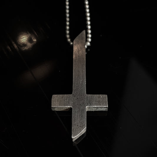 Heretic - Inverted minimalist asymmetrical cross pendant, silver