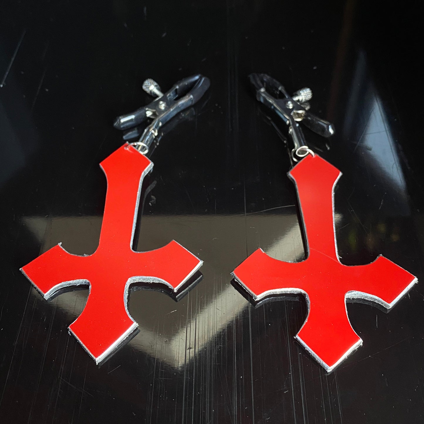 Heretic - inverted red cross nipple clamps