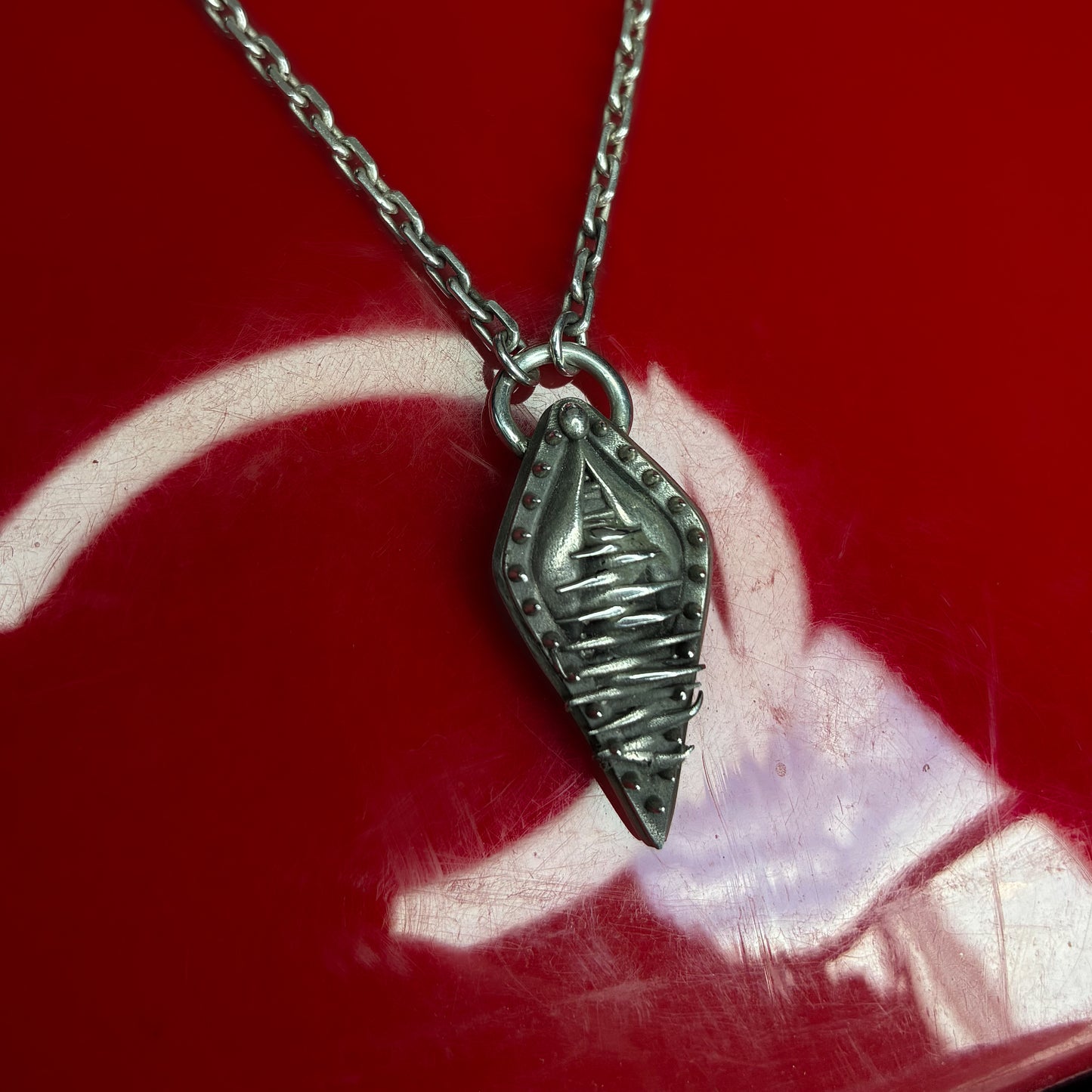Vagina Dentata - female genitals with spike teeth pendant, sterling silver