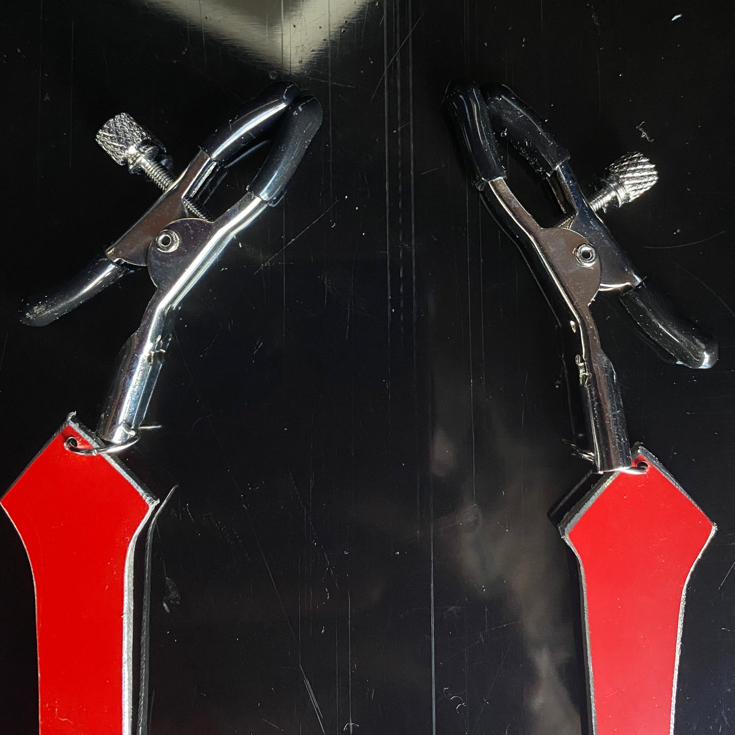 Heretic - inverted red cross nipple clamps