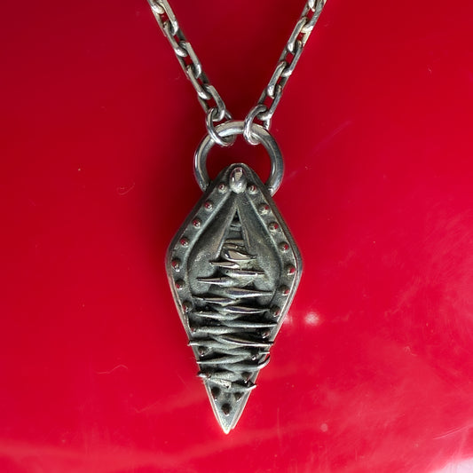 Vagina Dentata - female genitals with spike teeth pendant, sterling silver