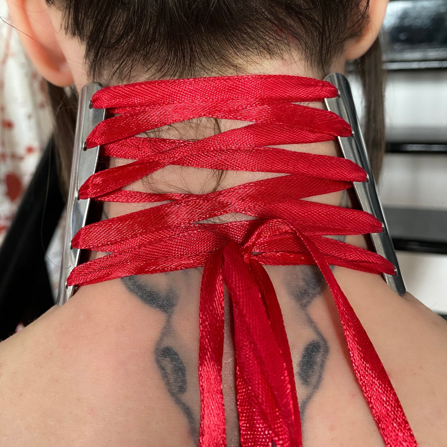 Missulena - stainless steel red ribbon neck corset
