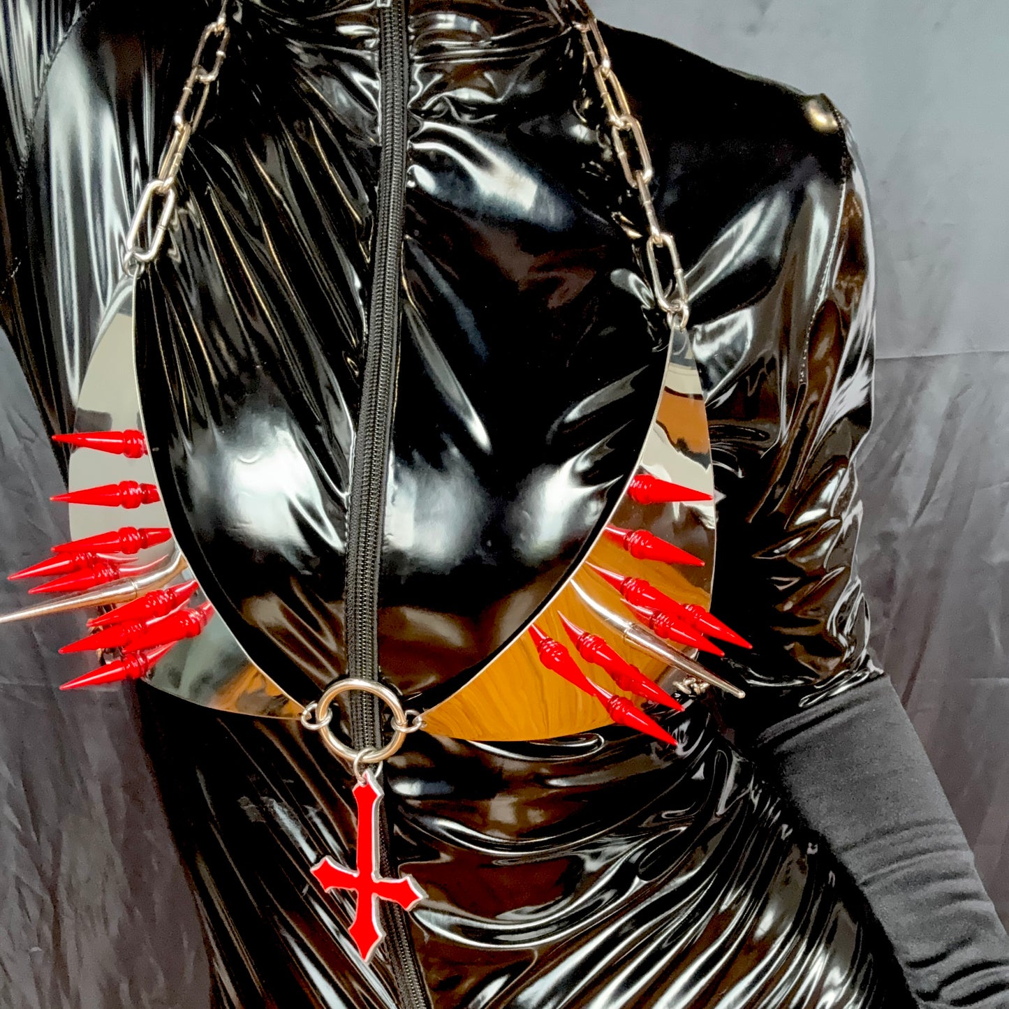 Unsainted bikini bra with red spikes