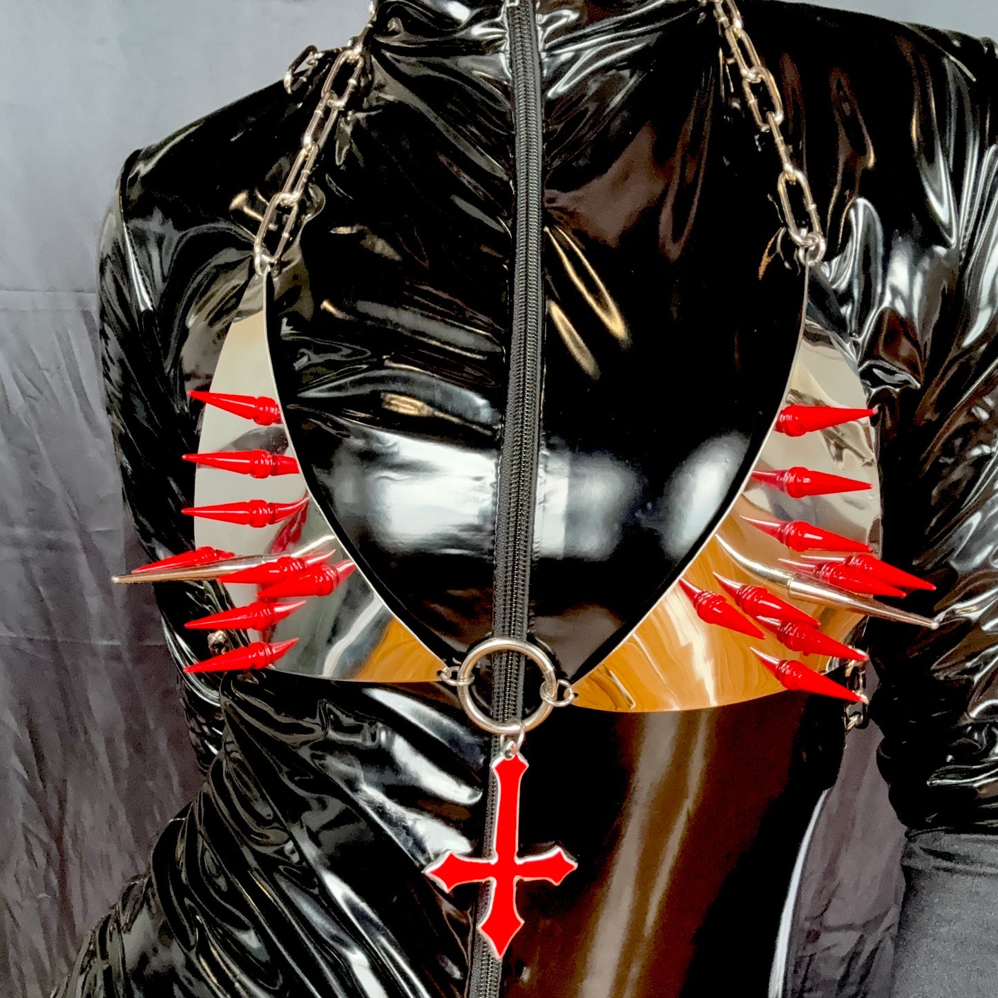 Unsainted bikini bra with red spikes