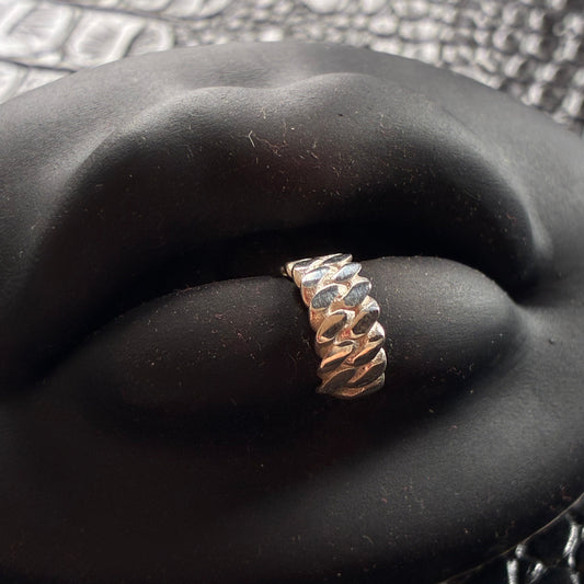 A sterling silver chain lip cuff. 